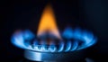Gas burner flame igniting, symbolizing energy, combustion, and heating Royalty Free Stock Photo