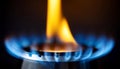 Gas burner flame igniting, symbolizing energy, combustion, and heating Royalty Free Stock Photo