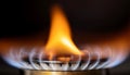 Gas burner flame igniting, symbolizing energy, combustion, and heating Royalty Free Stock Photo