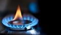 Gas burner flame igniting, symbolizing energy, combustion, and heating Royalty Free Stock Photo