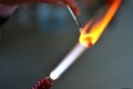 Gas burner glows glass decoration, lampwork Royalty Free Stock Photo