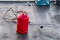 A gas burner of a roofer standing on the roof Royalty Free Stock Photo