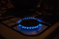 Gas burner on white modern kitchen stove. Royalty Free Stock Photo