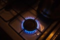 Gas burner on white modern kitchen stove. Royalty Free Stock Photo