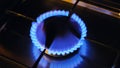 Gas burning blue flame.Household gas consumption. Gas shortages and purchases. gas savings.