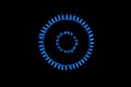 Gas burns blue on black background. Heat and Mirage above the gas hob switched on. Top view of a kitchen burner glowing Royalty Free Stock Photo