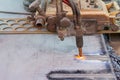 Gas cutting machine on steel plate Royalty Free Stock Photo