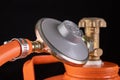 Gas cylinder and propane-butane gas reducer. Accessories for home gas supply Royalty Free Stock Photo