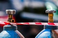 Gas cylinders tied with protective tape Royalty Free Stock Photo