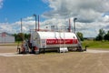 A gas and diesel bar for trucks delivering grain