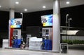 Gas dispenser of PTT gas station in Thailand on dark night.