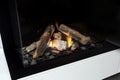 Gas fireplace with white mantel modern interior luxury design, close-up in a modern home Royalty Free Stock Photo