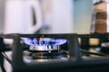 Gas flames burning on kitchen stove top Royalty Free Stock Photo