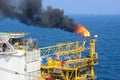 The gas flare is on the offshore oil rig Royalty Free Stock Photo