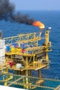 The gas flare is on the offshore oil rig Royalty Free Stock Photo