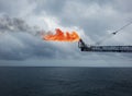 The gas flare is on the oil rig platform. Royalty Free Stock Photo