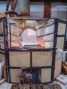 Gas glass melting furnace or kiln in handmade glass studio Royalty Free Stock Photo