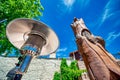 Gas heater, patio heater, mushroom heater, umbrella heater under a blue sky Royalty Free Stock Photo