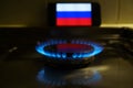 Gas at home for cooking. Natural gas also called fossil gas and Russian flag Nord Stream is a natural gas pipeline through the Royalty Free Stock Photo