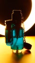 Gas lighter, perfume, bottle Royalty Free Stock Photo