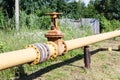 Gas line in village in summer day Royalty Free Stock Photo