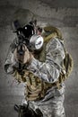 Gas Mask Soldier aiming rifle Royalty Free Stock Photo