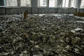 Gas masks on the floor with an old television in an abandoned middle school in Pripyat Royalty Free Stock Photo