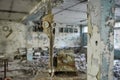 Gas masks on the floor with an old television in an abandoned middle school in Pripyat Royalty Free Stock Photo