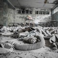 Gas masks placed around the devasted interior, Chernobyl radiation zone, Ukraine