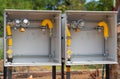 Gas meter boxes fitted with direct-action, spring-loaded regulators prepared for installation. Royalty Free Stock Photo