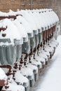 Gas meters covered with snow on the wall Royalty Free Stock Photo