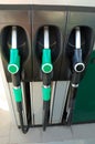 Gas nozzles at the gas station Royalty Free Stock Photo
