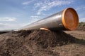 Gas and oil pipeline construction. Pipes welded together. Big pipeline is under construction Royalty Free Stock Photo