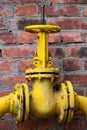 The gas pipe, yellow valve and yellow pipes