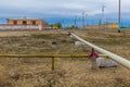 Gas pipelines in former Aral Sea port town Moynaq Mo ynoq or Muynak , Uzbekist Royalty Free Stock Photo
