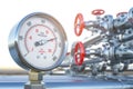 Gas pression gauge meters on gas pipeline. Gas extraction, production, delivery and supply concept