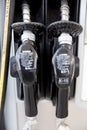 Gas pump nozzles close up Royalty Free Stock Photo