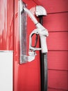 Gas pump nozzles in a service station Royalty Free Stock Photo