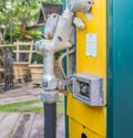 Gas pump nozzles in a service station