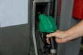 Gas pump nozzles in a service station for refueling car on gas station Royalty Free Stock Photo