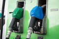 Gas pump nozzles in station Royalty Free Stock Photo