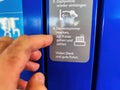 Gas Pump Payment Instructions at Esso Gas Station in Germany Royalty Free Stock Photo