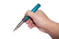 Gas soldering iron in the hand Royalty Free Stock Photo