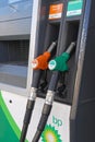 Gas station gasoline pump fuel nozzles Royalty Free Stock Photo