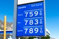 Gas station price sign showing record high gasoline prices for over 7 dollars a gallon of regular gas Royalty Free Stock Photo