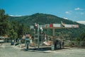 Gas station on street and hilly landscape