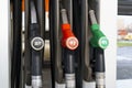 Gas station with refueling nozzles of gasoline and diesel fuel Royalty Free Stock Photo