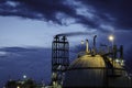 Gas storage spheres tank in petrochemical plant at night