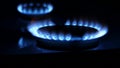 Gas stove burners in the dark turned on and off, stock video footage