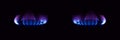 Gas stove burning in the kitchen, blue flames black background Royalty Free Stock Photo
